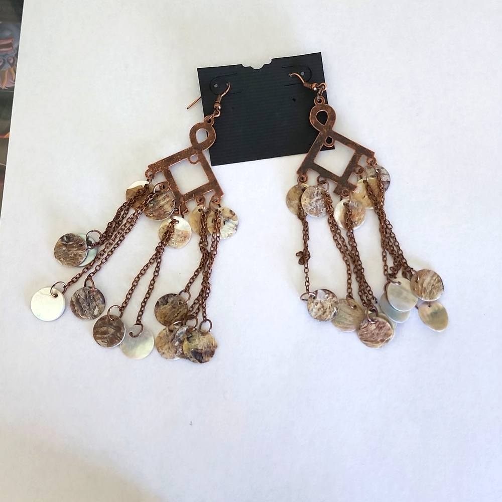 Brass dangle earrings with shell pieces